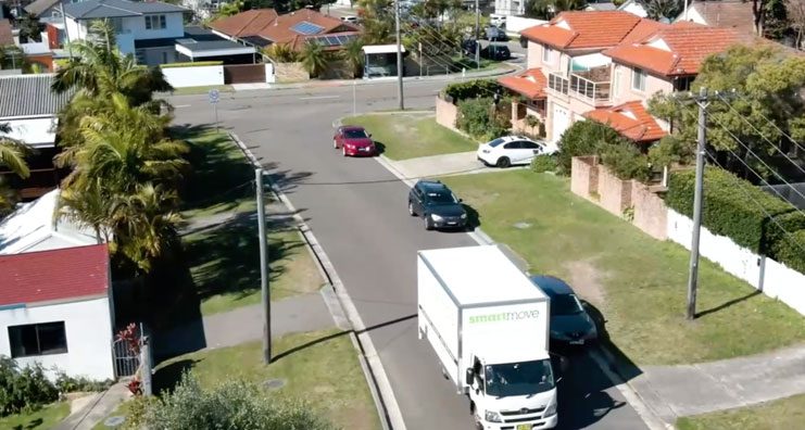 A Smart Move truck in action working as removalists from Sydney to Newcastle